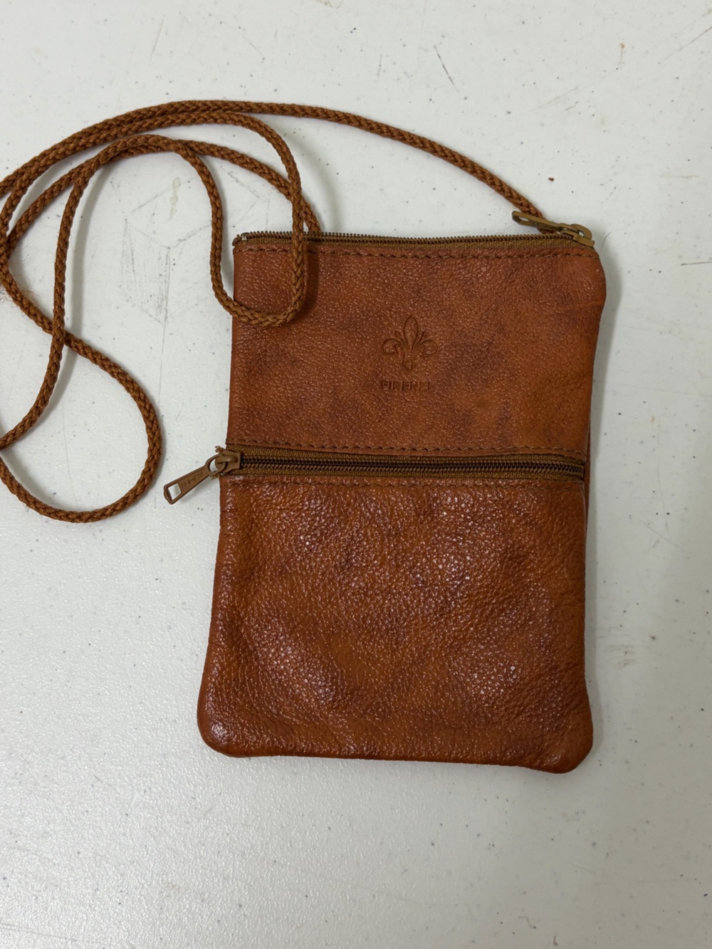 Vintage-Inspired Tan Leather Crossbody Pouch with Braided Strap